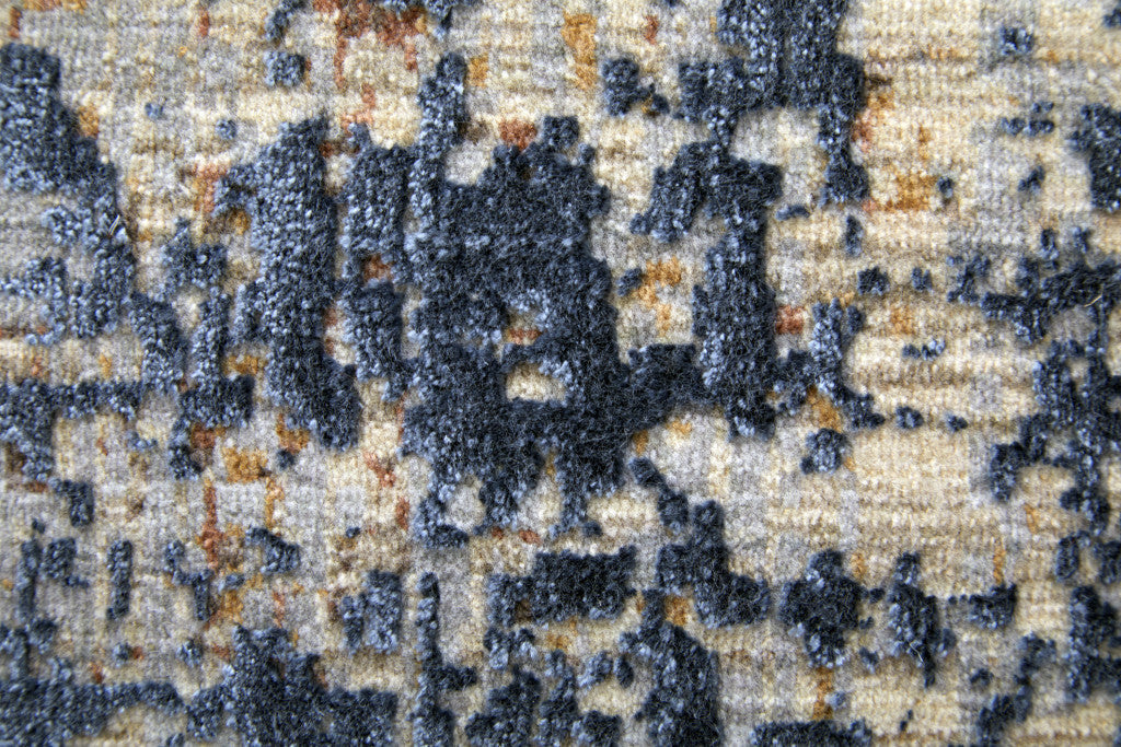 10' X 13' Blue Brown and Tan Abstract Power Loom Area Rug