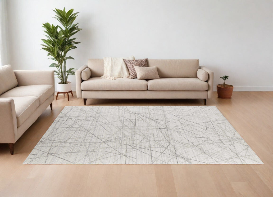 9' X 12' Gray and Ivory Abstract Hand Woven Area Rug