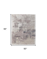 5' X 8' Brown Black and Tan Abstract Hand Tufted Area Rug