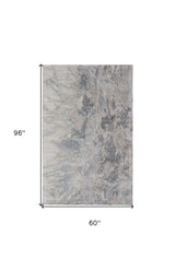5' X 8' Gray Tan and Green Abstract Hand Tufted Worn Faded Area Rug